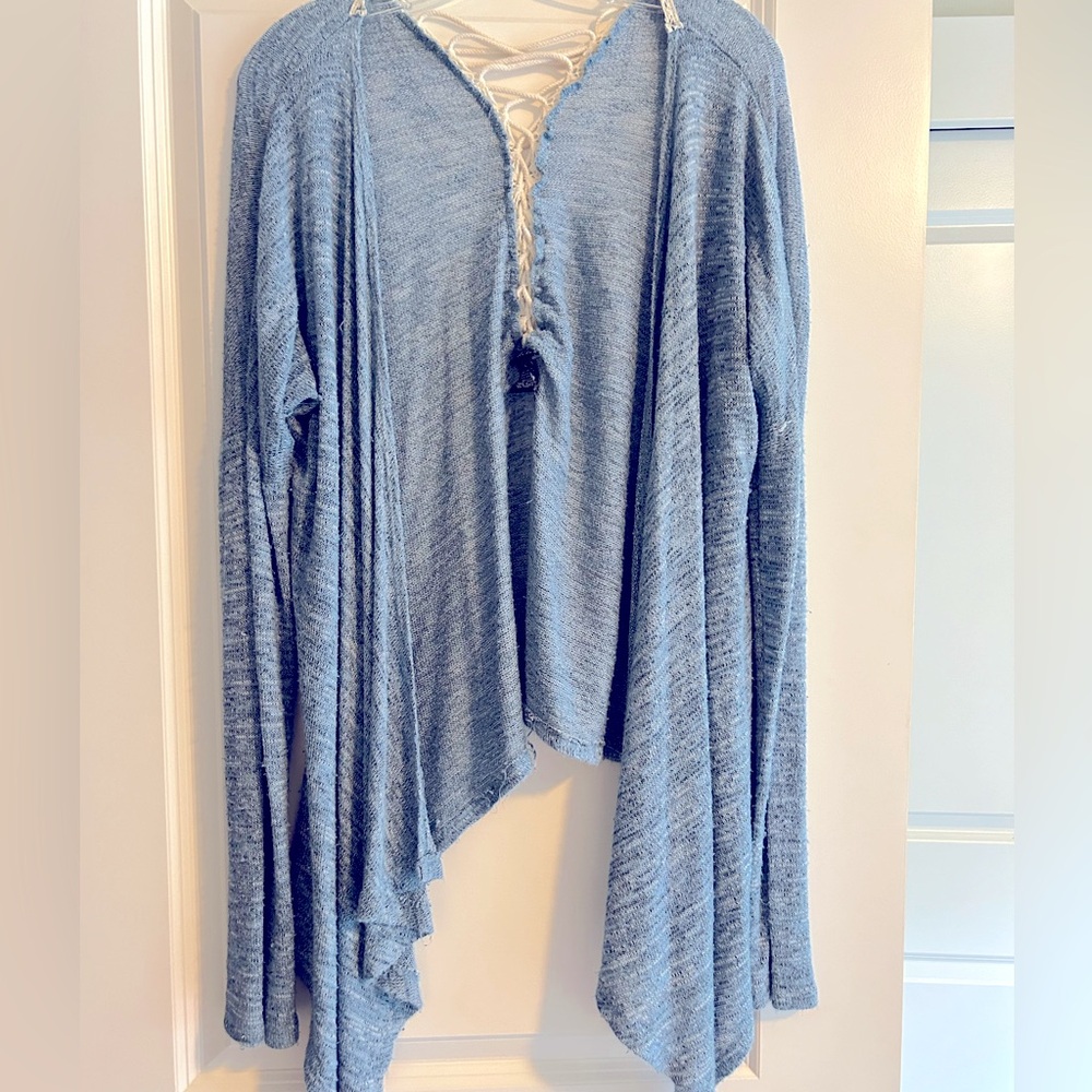 Soft blue cardigan with interlaced back